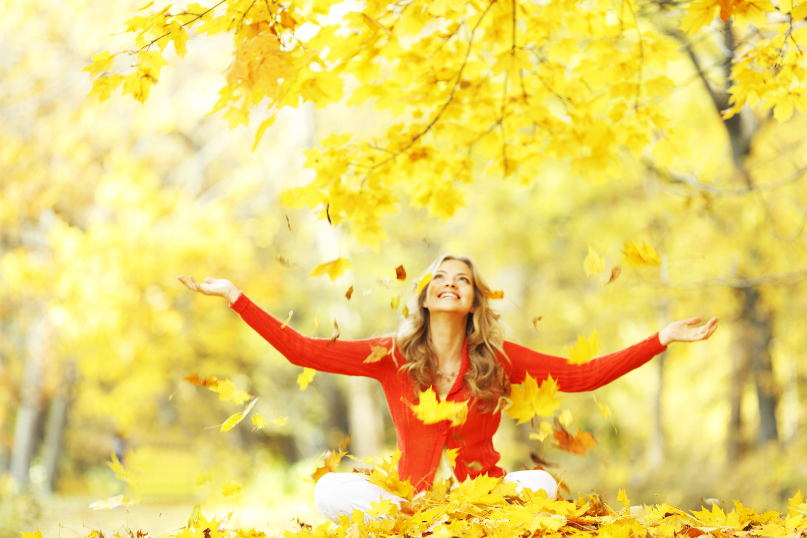 bigstock-happy-woman-in-autumn-park-dro-53109049.jpg