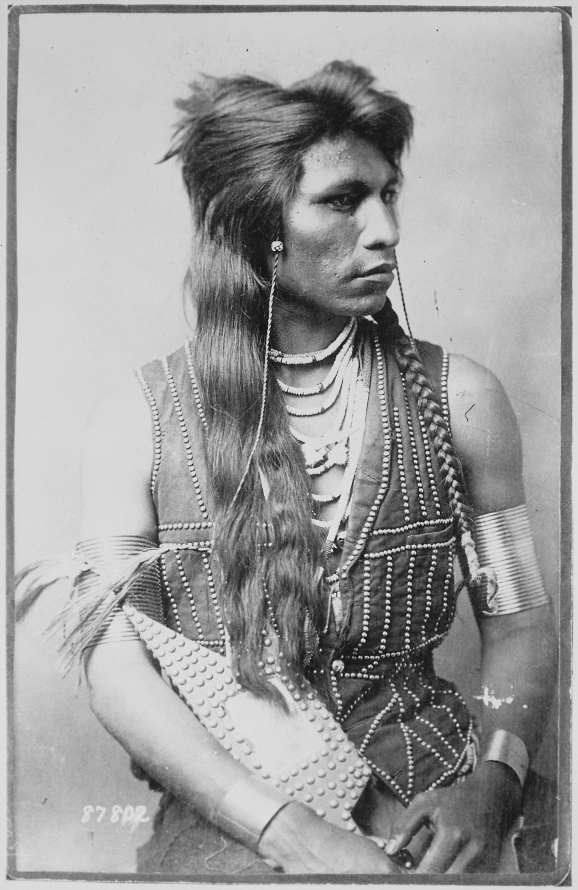 rabbit-tail_shoshone_member_of_captain_ray_s_scout_company_half-length_seated_with_bracelets_and_ornamented_vest_nara_530920.jpg