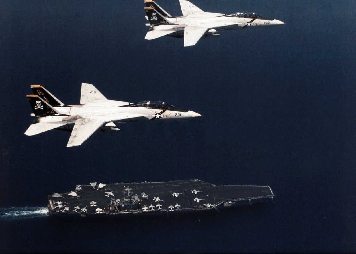 f-14as_vf-84_flying_over_uss_theodore_roosevelt_cvn-71_1989.jpg