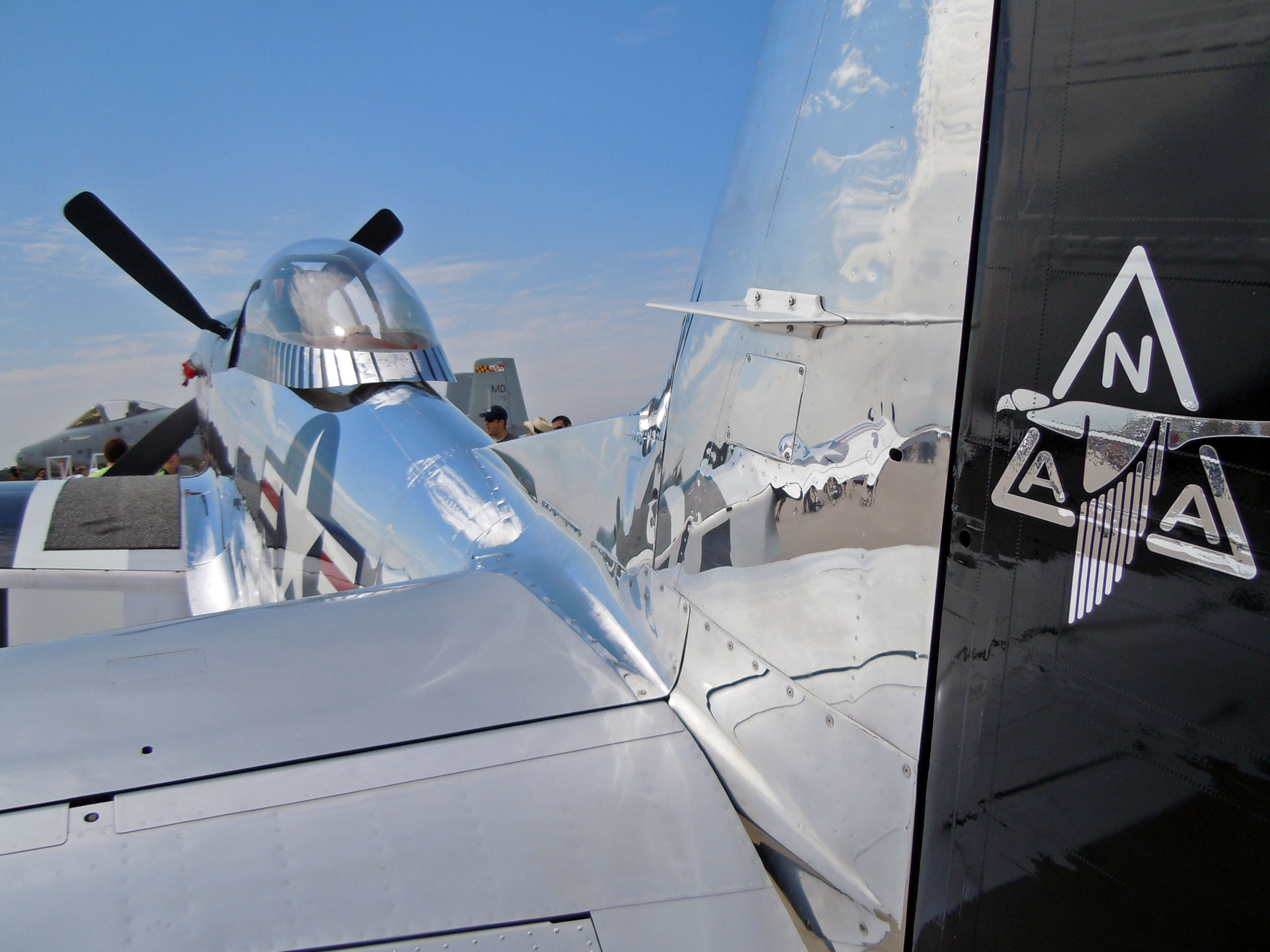 p-51_mustang_with_north_american_aviation_tail_logo.jpg