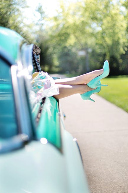 woman-s-legs-high-heels-vintage-car-turquoise-90767.jpeg