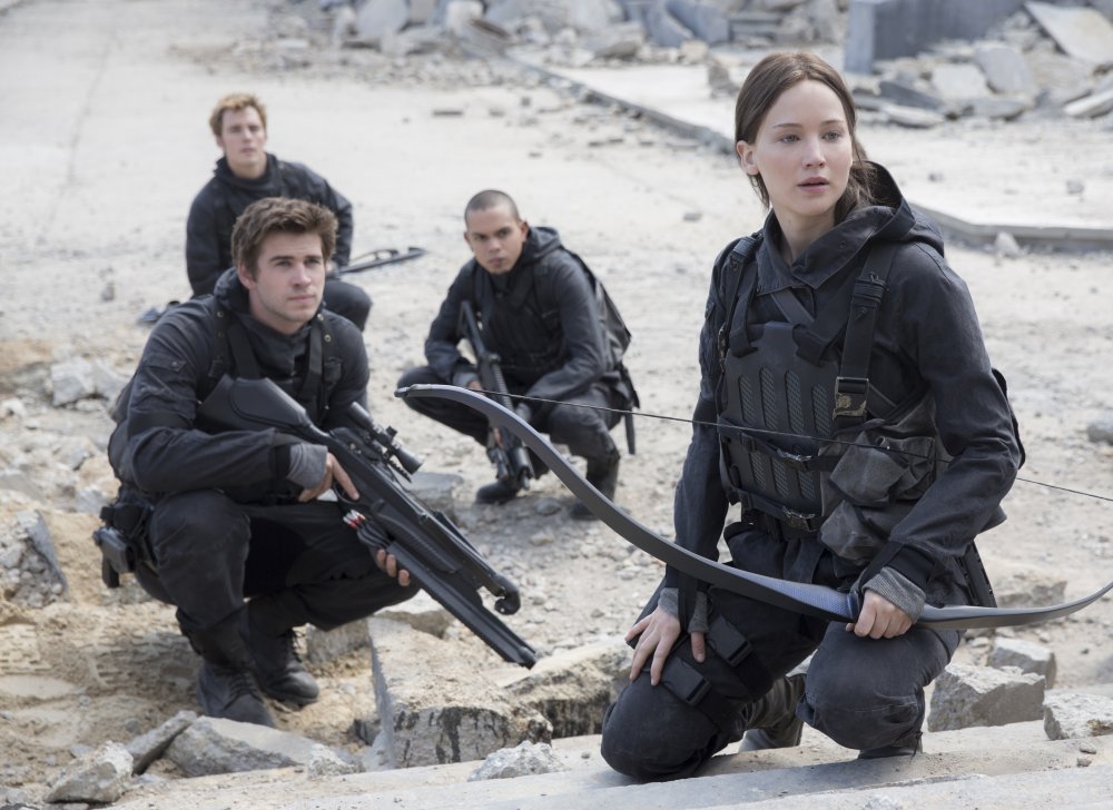 hunger-games-mockingjay-part-two-the-2015-002-katniss-gale-and-two-more-rebels-crouched-in-dust-of-capitol-original.jpg