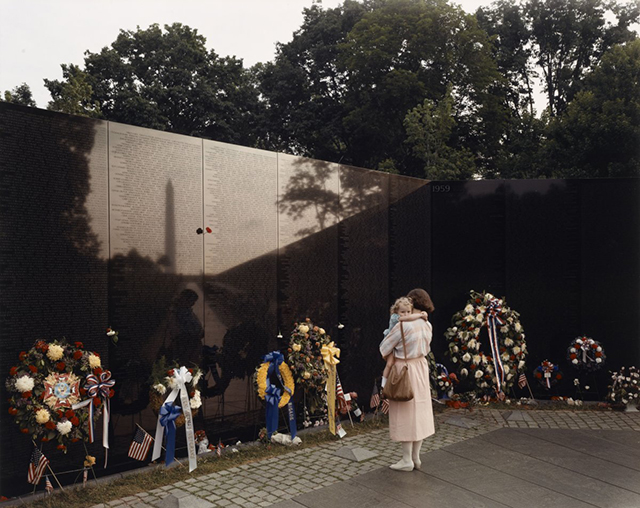 a-woman-and-child-visit-the-vietnam-veterans-memorial-in-washington-dc-1986-the-wall-which-features-the-names-of-all-those-killed-or-missing-in-action-was-completed-in-1982.jpg