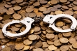 Hand-cuffs-and-coins.jpg