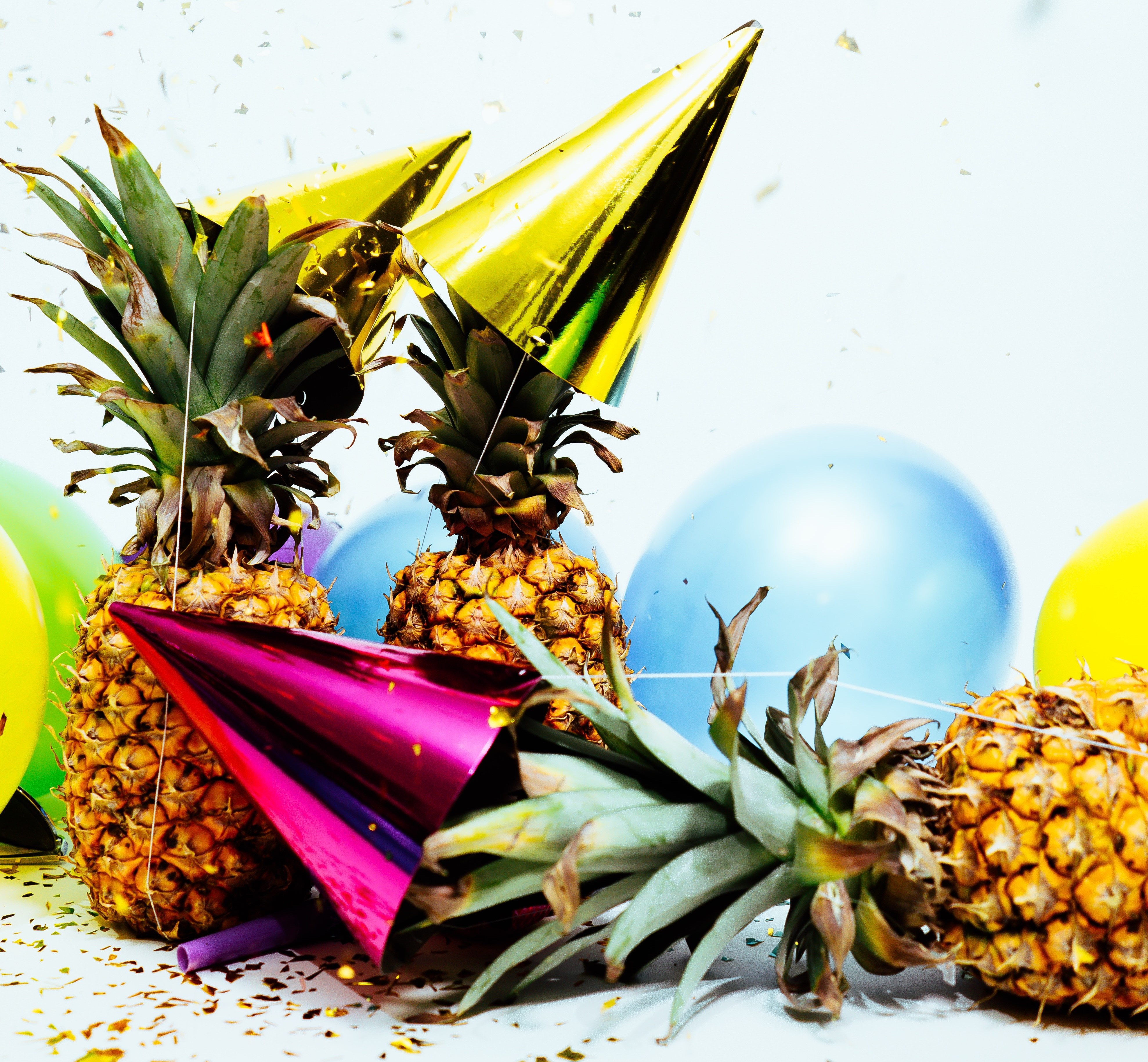 three-pineapples-with-gold-party-hats-1071883_1.jpg