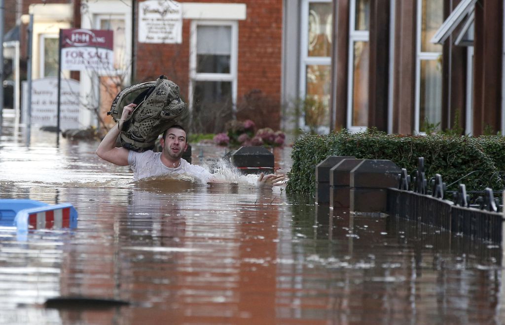 uk-storm-desmond-man-wading.jpg