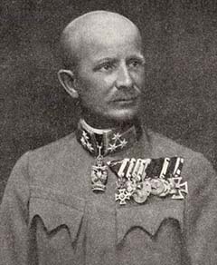 Bugsch Aladár ezredes (1867–1938) a 20-as honvédek ezredparancsnoka az Isonzói harcok idején. Az ezredet 1918. július 26-ig, 39 hónapon keresztül irányító parancsnok lett később az ezredtörténet összeállítója is