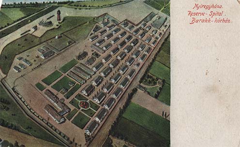 Egy teljes barakk-kórház ábrázolása: a nyíregyházi barakk-kórház egy korabeli képeslapon