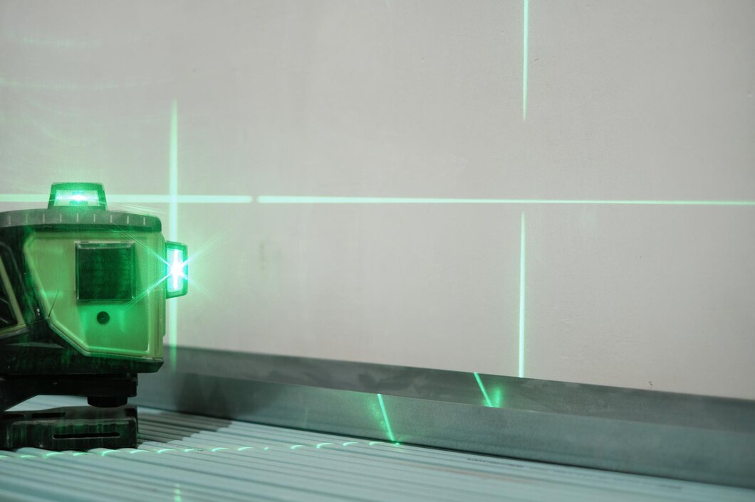 laser-measuring-level-construction-work-during-work-shallow-depth-field-green-laser-beams-level-measurement-construction-finishing-works_166373-1898.jpg