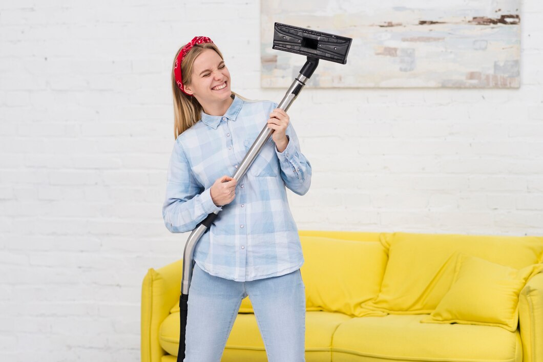 woman-cleaning-playing-with-vacuum_23-2148394962.jpg