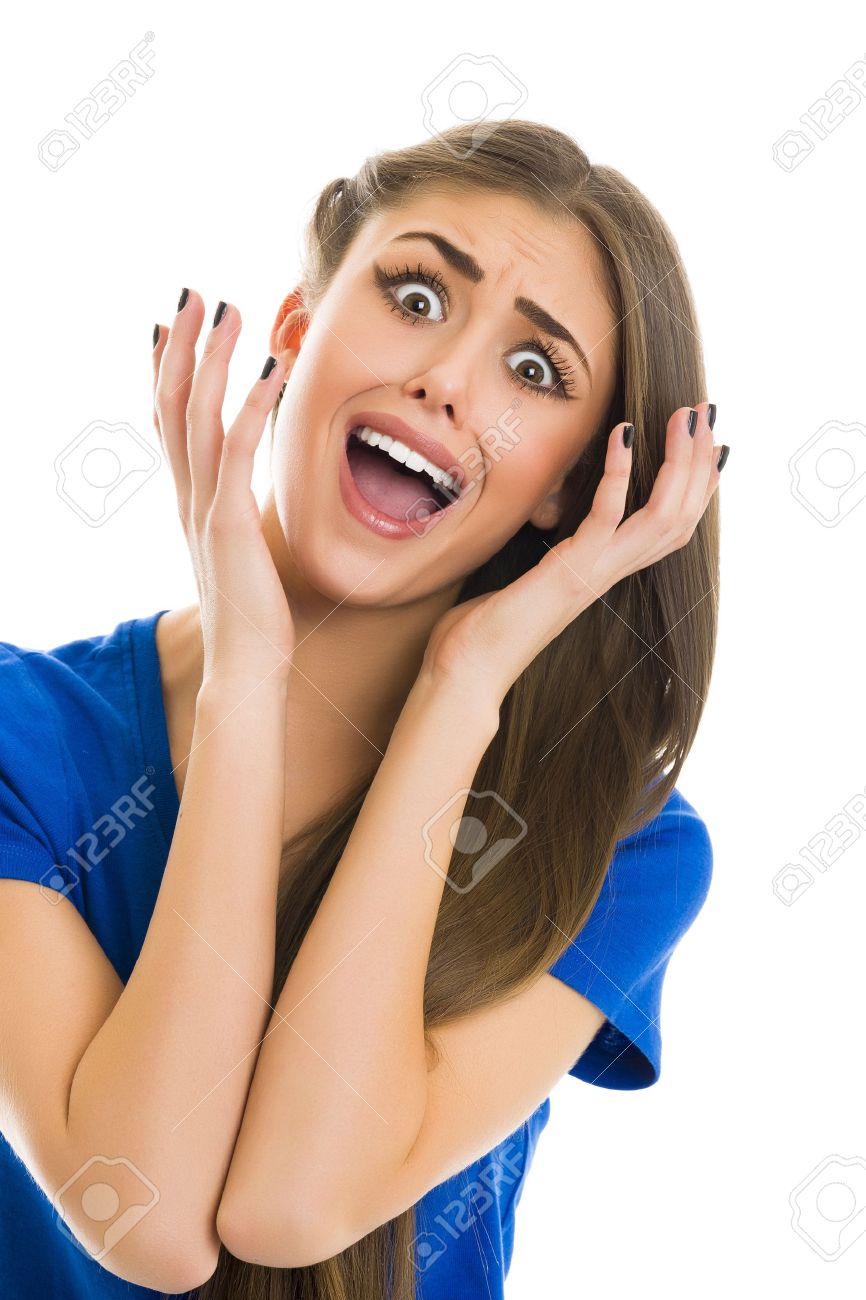 21863789-surprised-young-woman-with-shocked-facial-expression-screaming--stock-photo.jpg