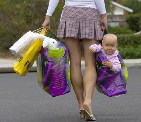 baby-carrying-in-bag-funny-transportation-picture.jpg