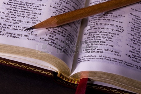 12173264-open-holy-bible-and-pencil.jpg