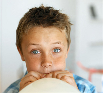 child-blowing-balloon.jpg