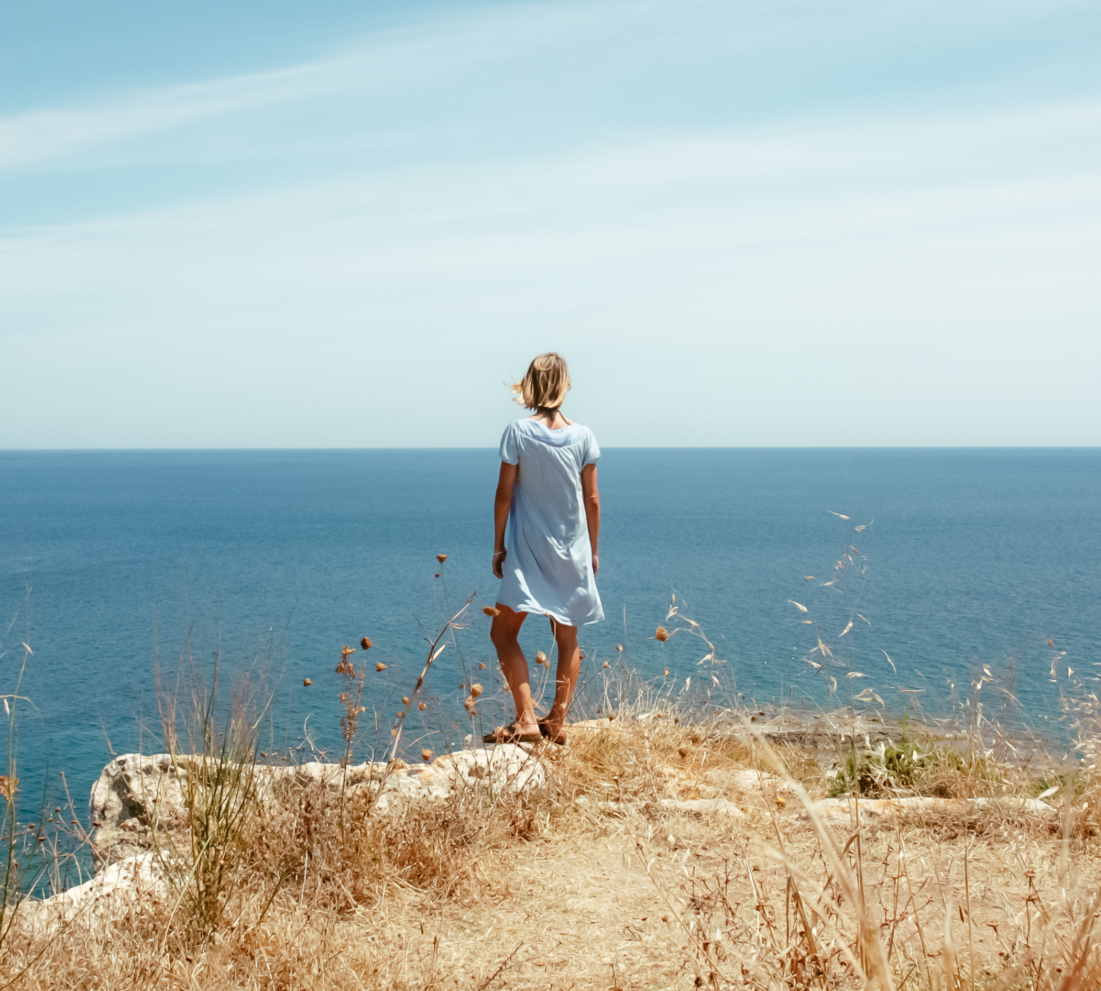 rear-view-woman_beach_sky.jpg
