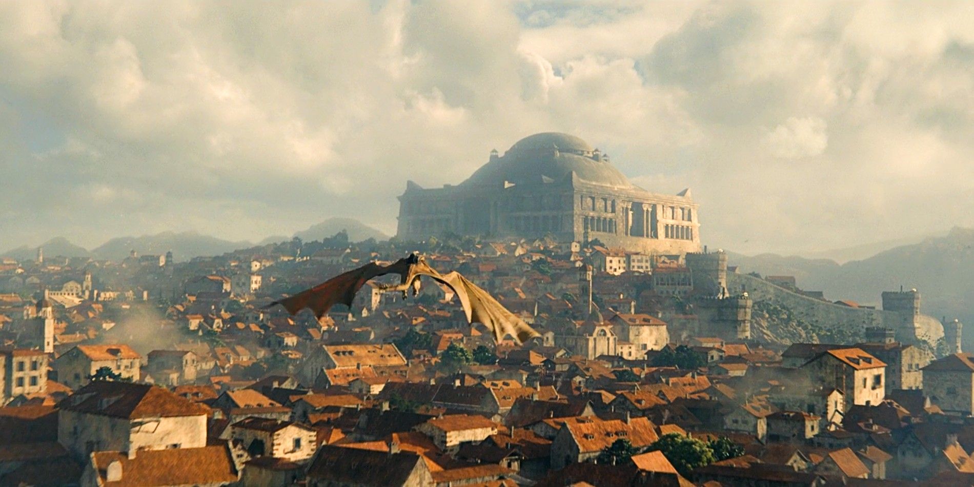 milly-alcock-as-young-rhaenyra-targaryen-on-the-back-of-syrax-in-house-of-the-dragon-with-a-backdrop-of-kings-landing.jpg