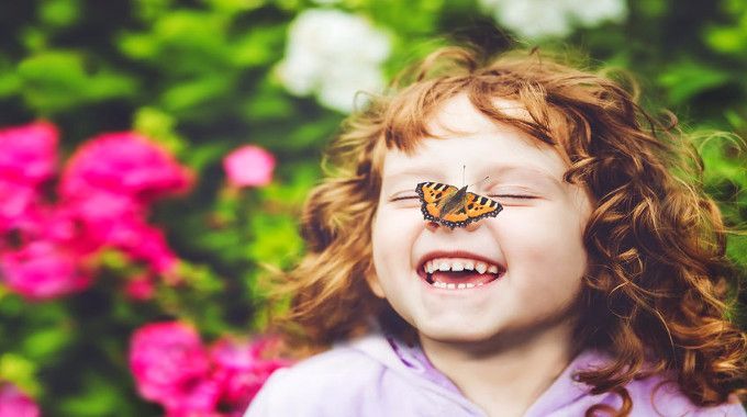 laughing-girl-with-butterfly-on-her-nose-compressed.jpg
