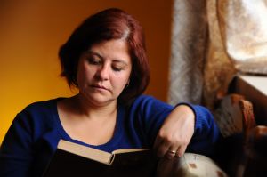 1207951_woman_reading_at_home.jpg