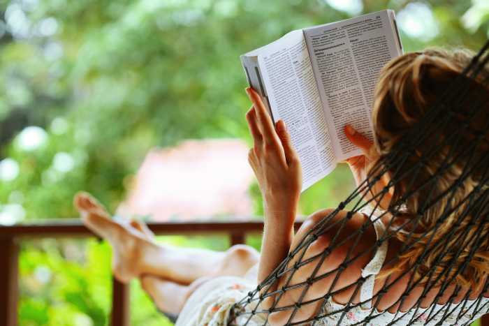 bigstock-young-woman-reading-a-book-lyi-14022518.jpg