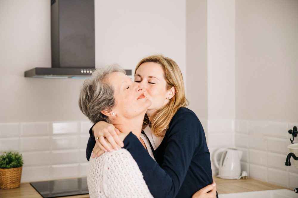 daughter-kissing-mom-mothers-day.jpg