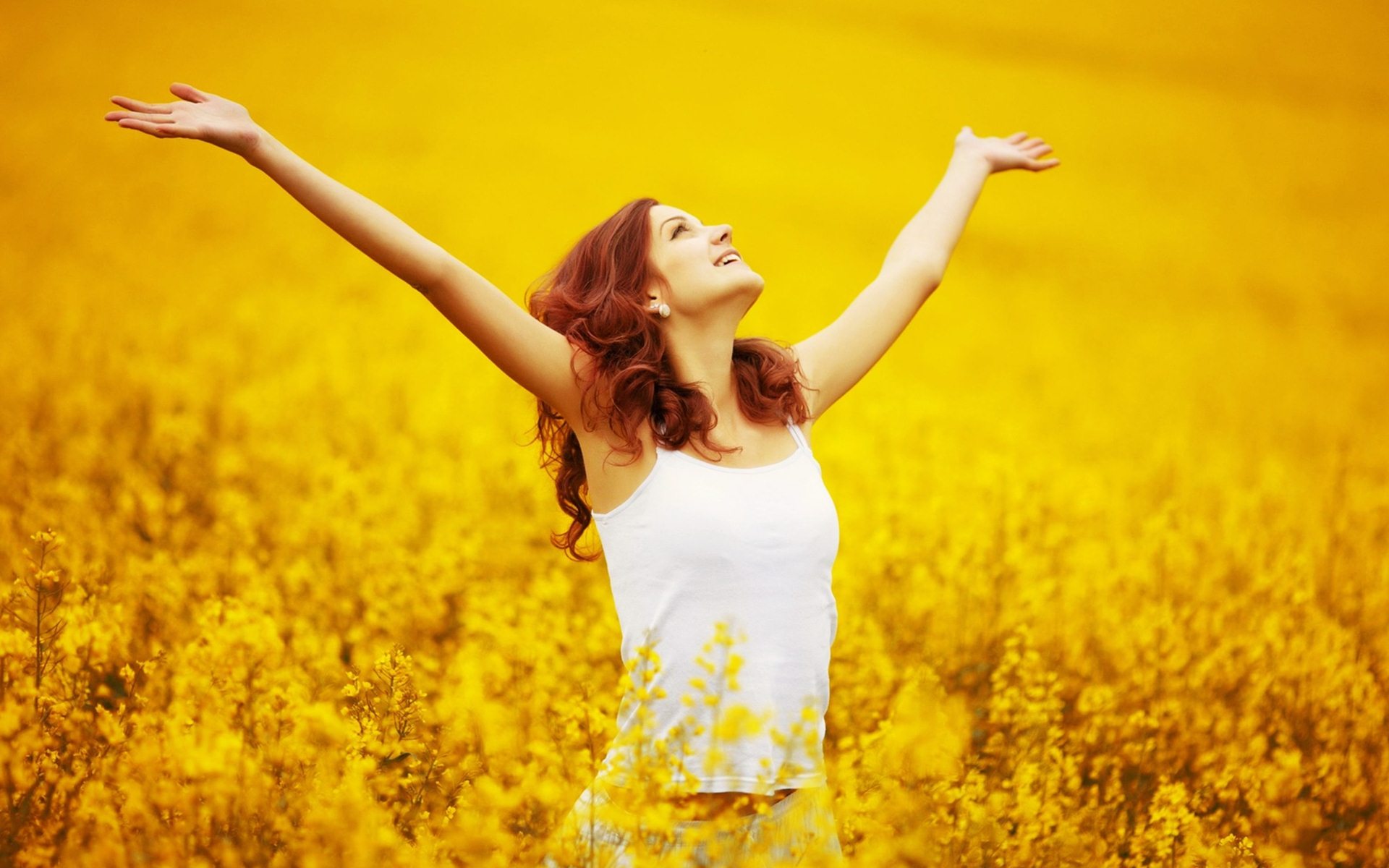 happy-girl-in-yellow-fields-wallpaper.jpg