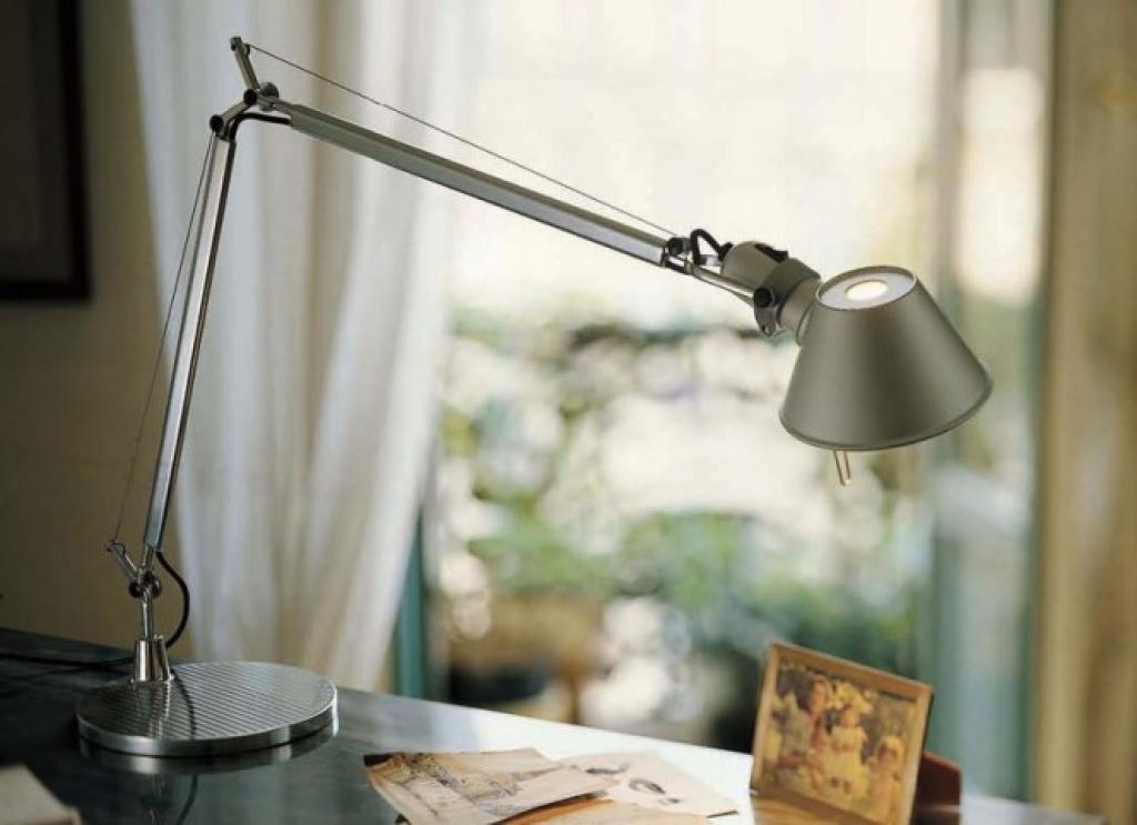 metal-desk-lamp-for-reading-or-for-interior-bedroom-lighting-with-small-foto-frame-under-the-frame.jpeg