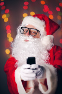 stock-photo-50652792-hipster-santa-claus-taking-selfie-on-cell-phone.jpg