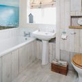 A tengerpart ihlette fürdőszoba