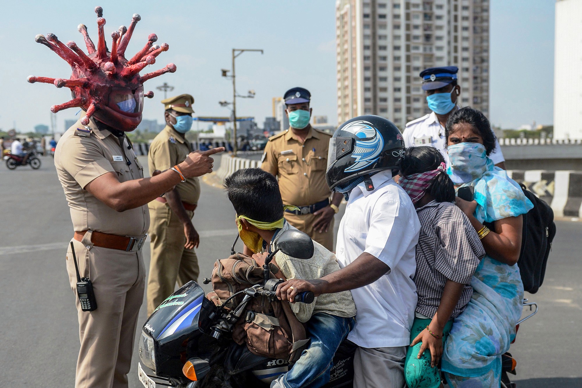 200331-coronavirus-helmets-india.jpg