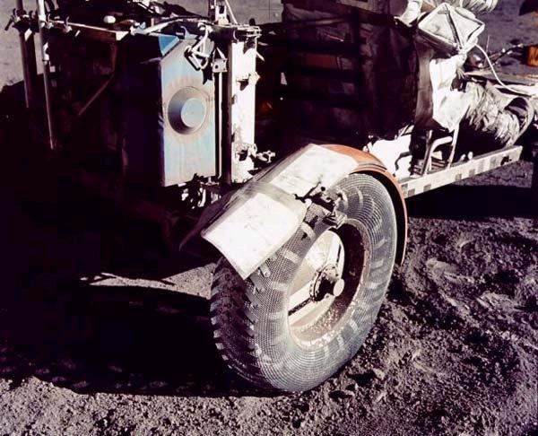 a-the-apollo-17-mission-lunar-rovers-fender-repaired-with-maps-clamps-and-duct-tape.png