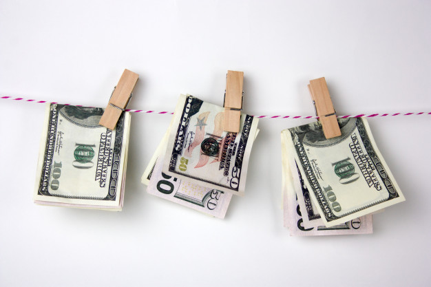 dollar-bills-with-clothespins-hang-rope_88775-894_1.jpg