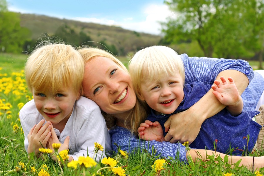 happy-mother-and-children-playing-outside.jpg