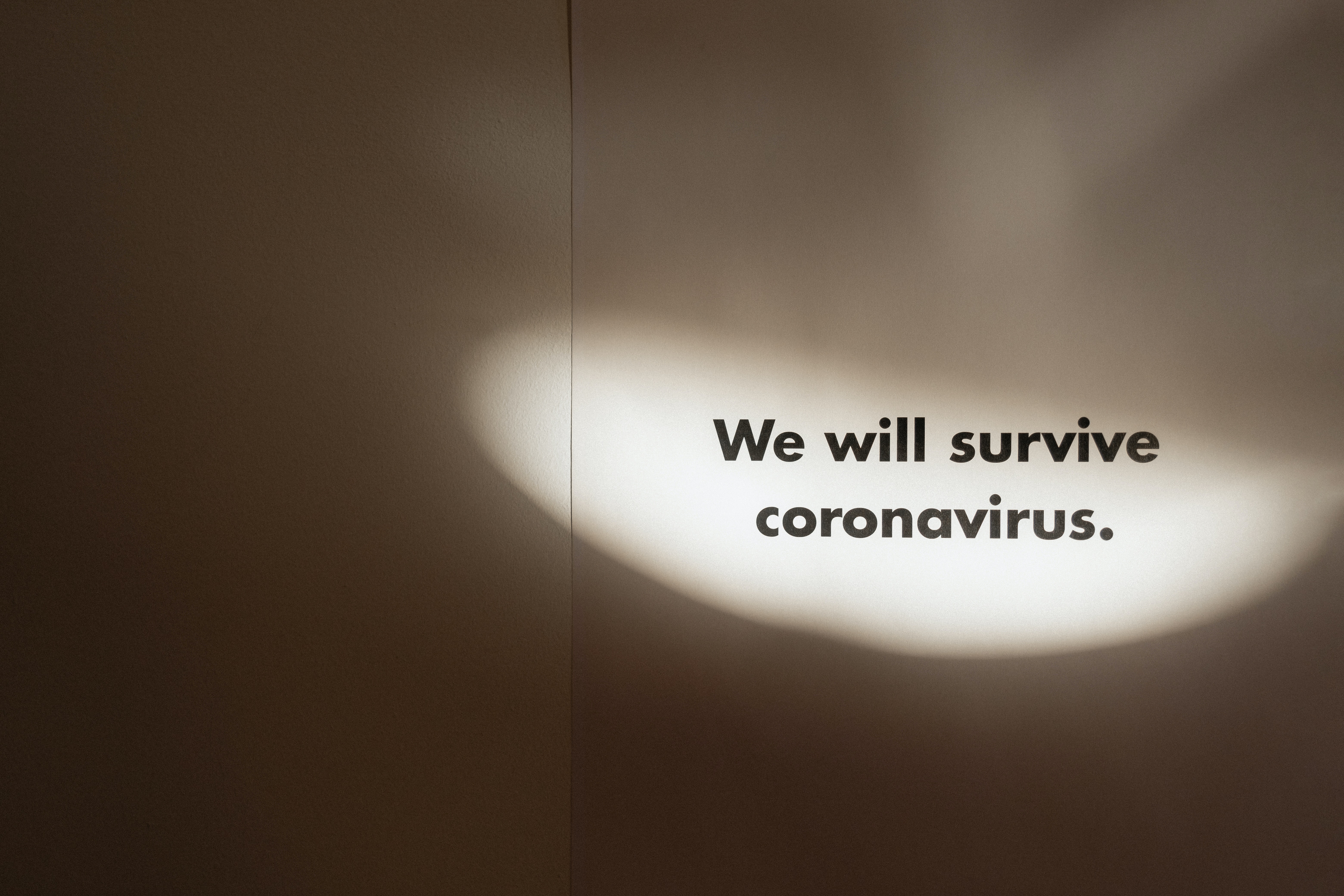 grayscale-photo-of-slogan-on-coronavirus-4108271.jpg
