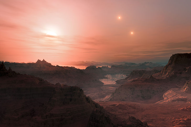 An artist's impression of GJ 667 Cc, a potentially habitable planet orbiting a red dwarf constituent in a trinary star system.jpg