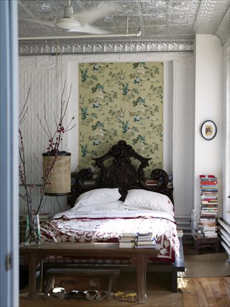 James Merrell bedroom black headboard tin ceiling floral wallpaper.jpg
