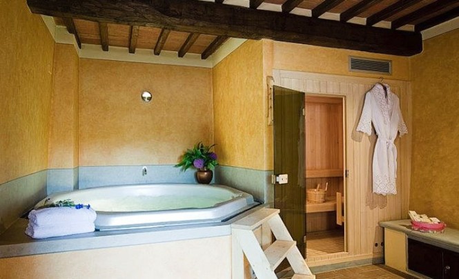 Tuscan-style-bathroom-large-bath-665x404.jpg