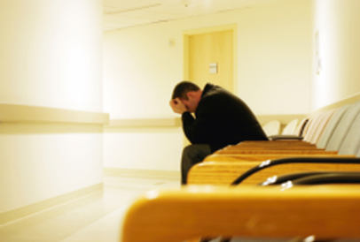 man in hospital waiting alone small.jpg