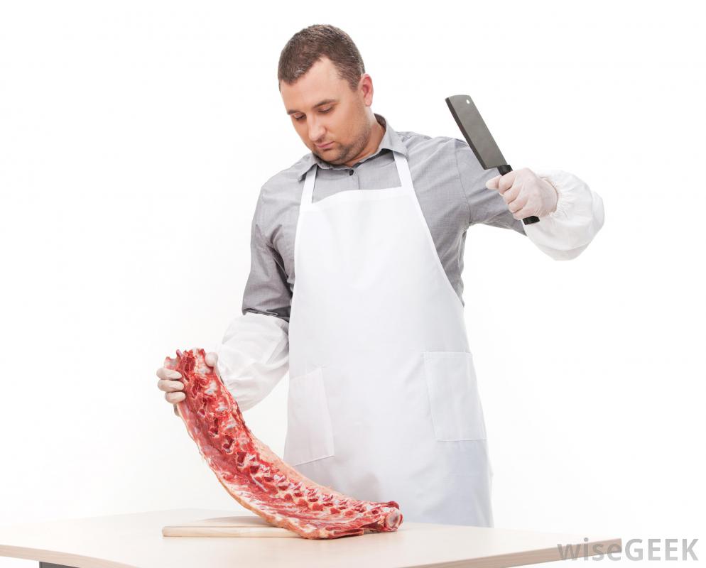 man-in-apron-with-hatchet-and-meat.jpg
