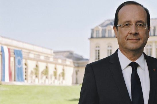 Francois Hollande French President with the Netherlands flag.png