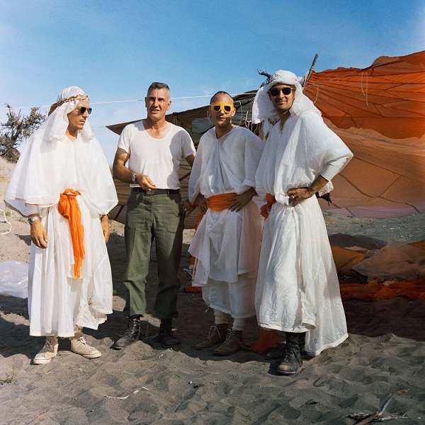 Astronauts Jack Swigert, Ken Mattingly and Charlie Duke shown with an instructor in 1967 during survival training..jpg