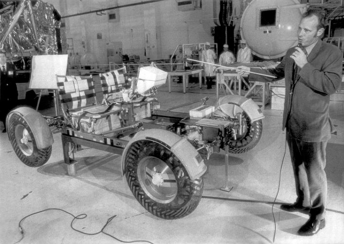 Rover 1 unveiled at Kennedy Space Center. Mr. Lindsey Bolton, project engineer for the Lunar Roving Vehicle, explains it's design at a press conference at KSC in March of 1971..jpg
