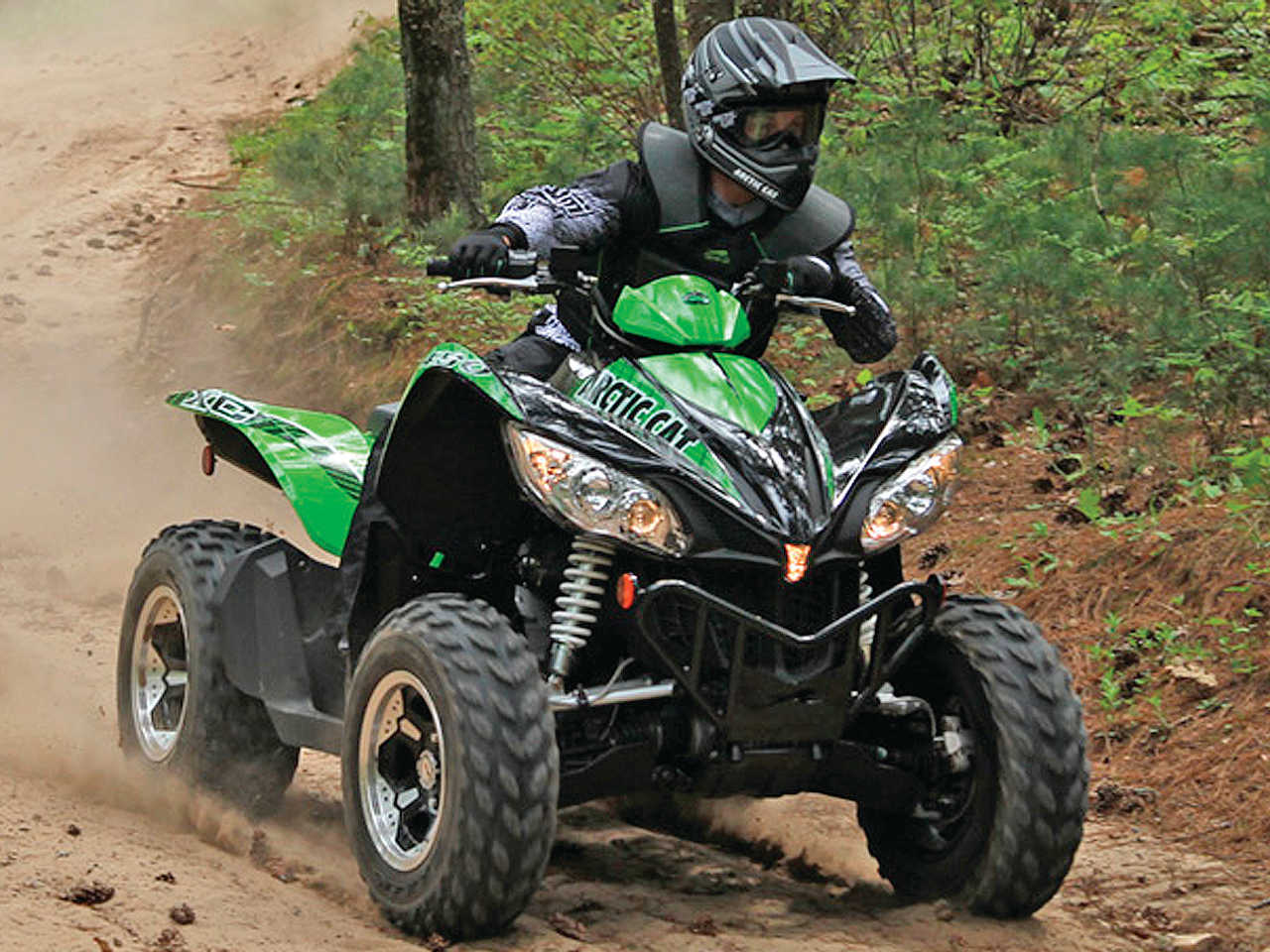 2013_arctic-cat_xc450_black-green_front-right_riding_on-trail_1.jpg