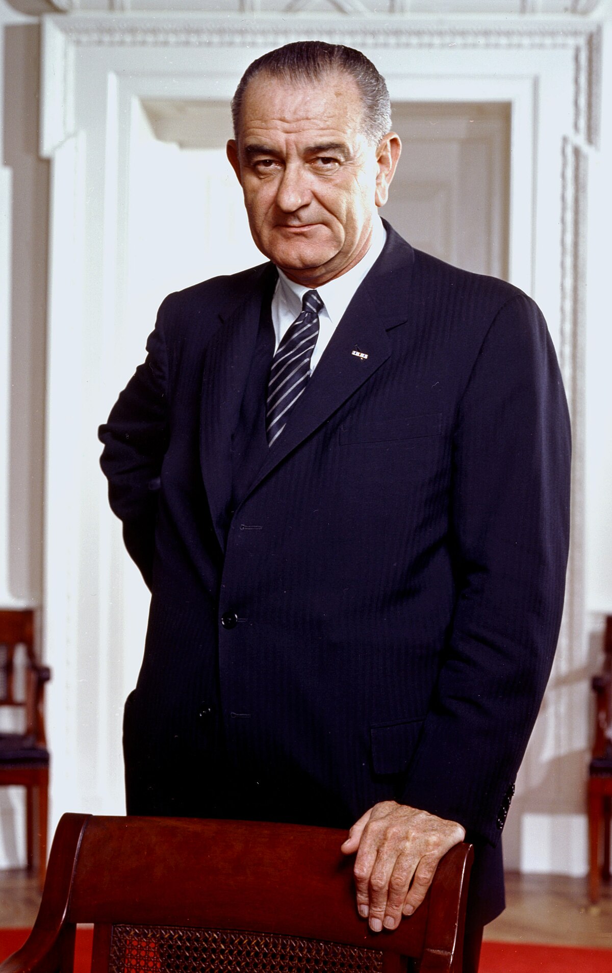 lyndon_b_johnson_photo_portrait_leaning_on_chair_color_cropped.jpg