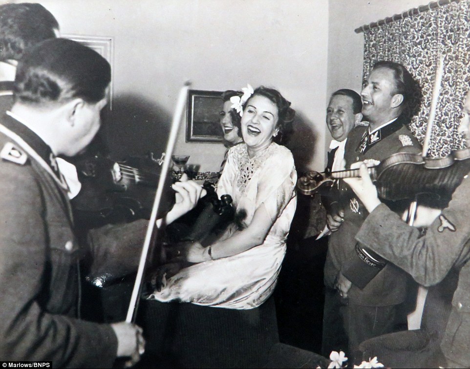 3b0e718300000578-4001200-gretl_pictured_being_serenaded_by_nazi_musicians_was_heavily_pre-a-22_1480946495369.jpg