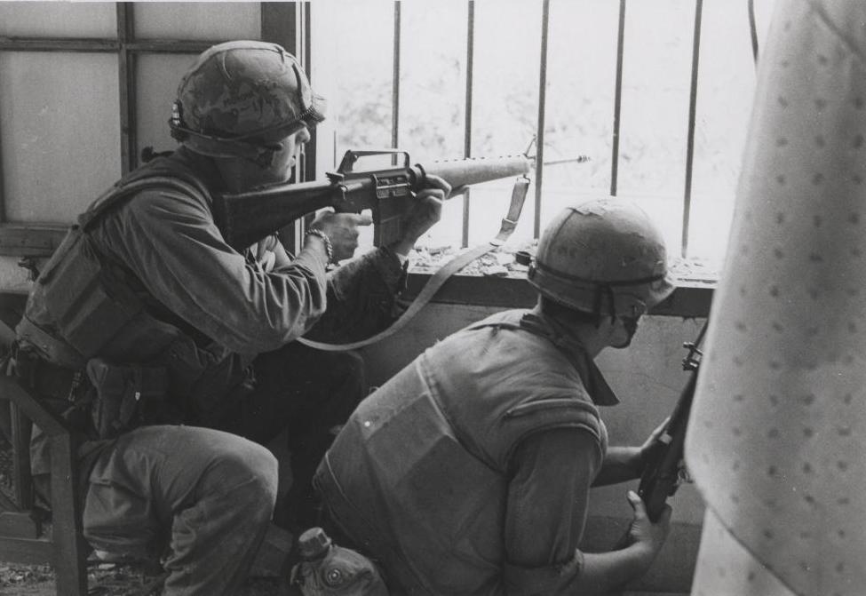 marines_fire_from_a_house_window_february_1968_16242259837_cropped.jpg