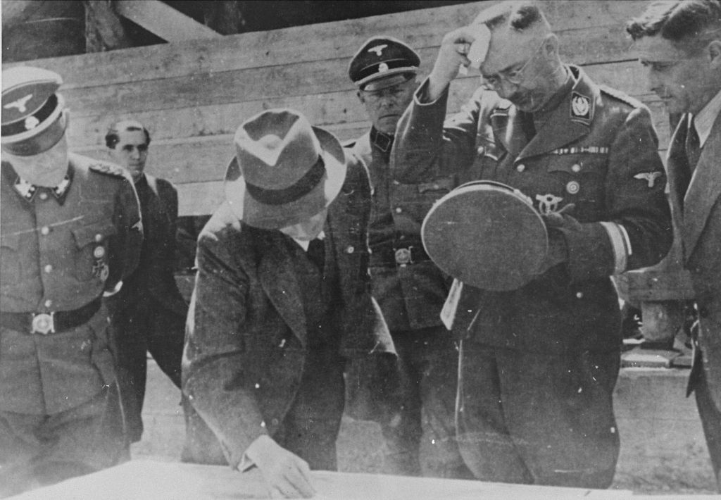 heinrich_himmler_and_max_faust_engineer_and_construction_manager_of_the_i_g_farben_auschwitz_plant_during_a_tour_of_the_building_site_near_the_concentration_camp_auschwitz_max_faust_shows_the_42jul17.jpg