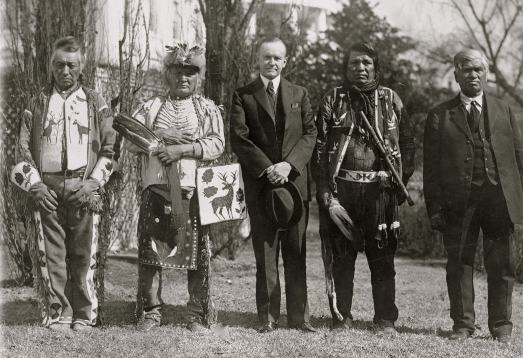 president_calvin_coolidge_with_osage_indians_at_the_white_house_in_1925.jpg