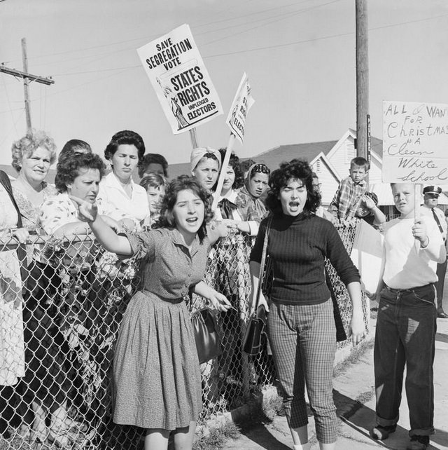 1960_segregationists_protest_the_attendance_of_6-year-old_ruby_bridges_at_william_frantz_elementary_school_new_orleans.jpg