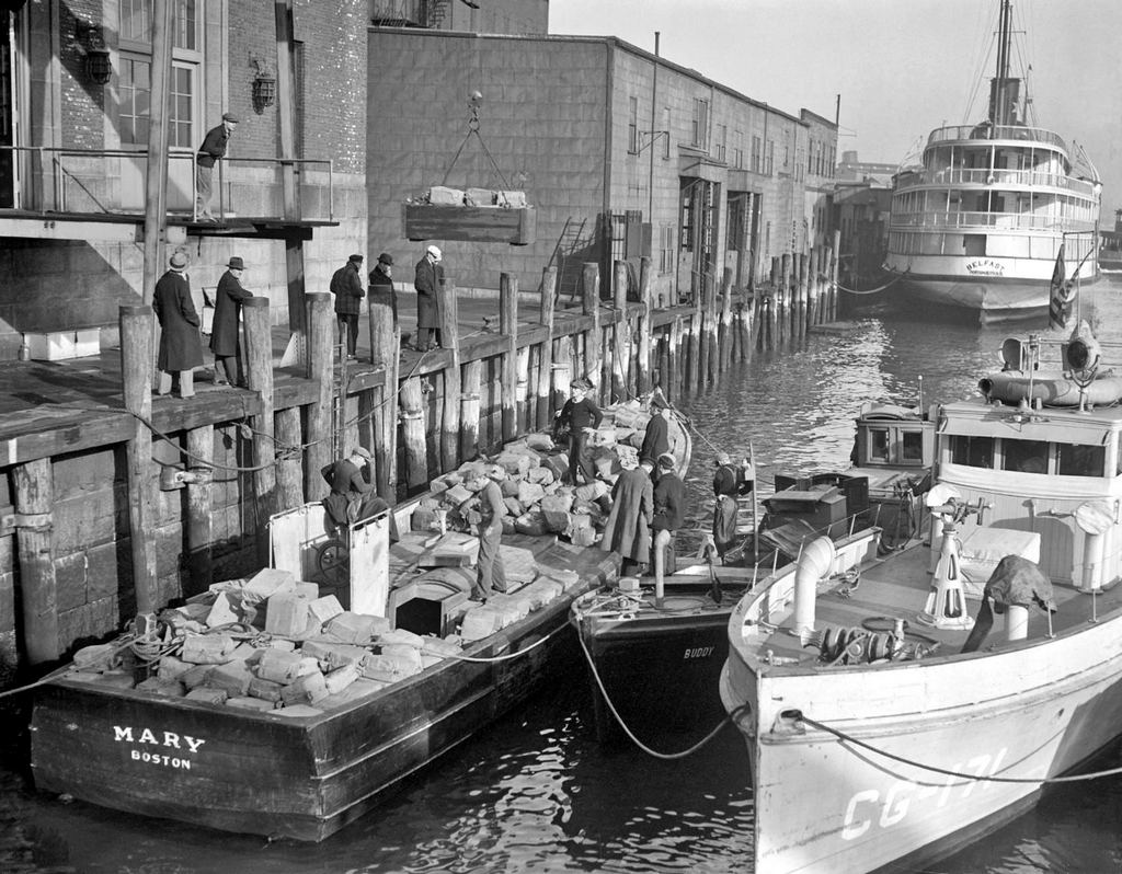 1932_rum_runner_mary_seized_with_175_000_in_liquor_in_dorchester_bay_brought_in_to_boston_waterfront.jpg