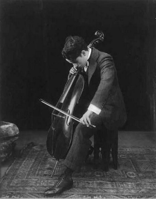 1915_chaplin_playing_chello.jpg